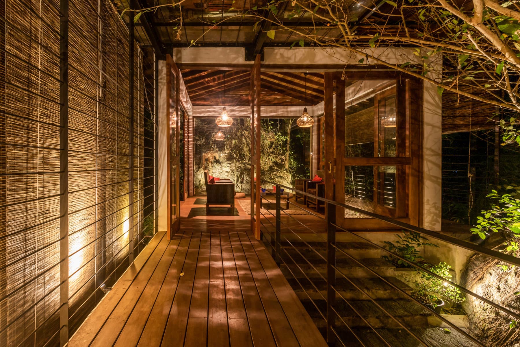 A Design Studio residence at golden hour, set into tropical landscape
